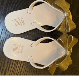 Mel by Melissa Jelly Flip Flop Sandals Off White Gold Glitter Bow Size 12US kids